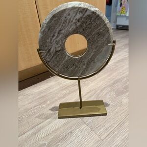Gray Stone Sculpture on Gold Stand